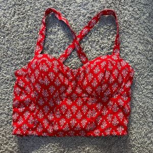 Red tank top, cross over back, rarely worn